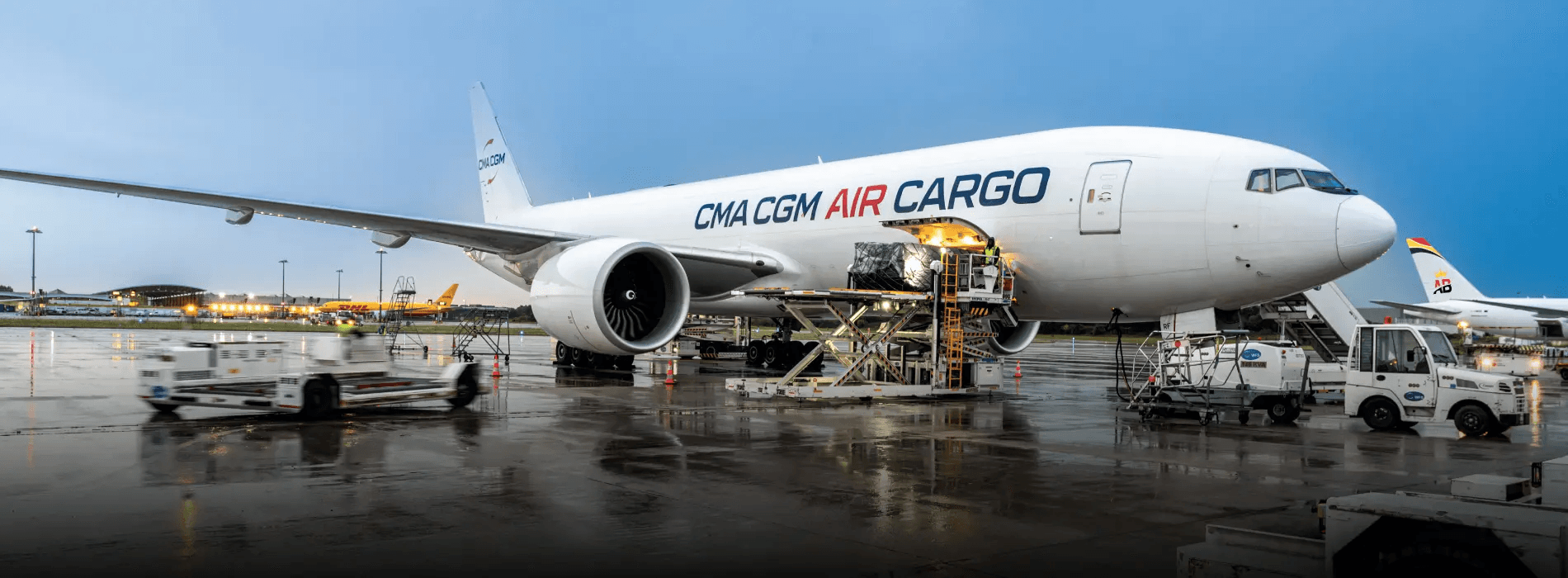 Air cargo freighter being loaded on the tarmac